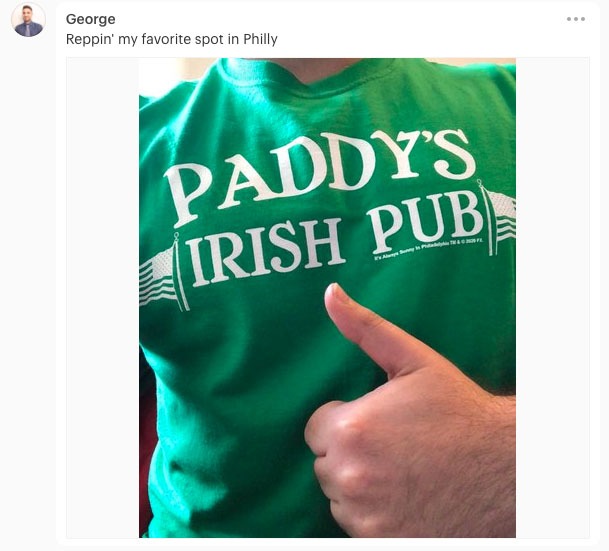 Intranet use case: Comment in Simpplr intranet showing a photo of a Paddy's Pub shirt