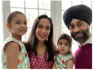 Sikh couple posing with children