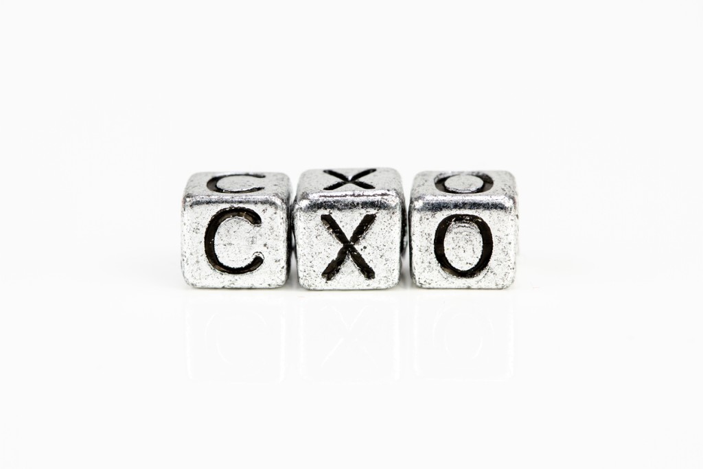 Cubic metal figures with the letters CXO on them