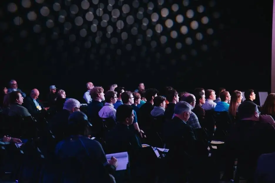 Town hall meeting - wide shot of a town hall meeting