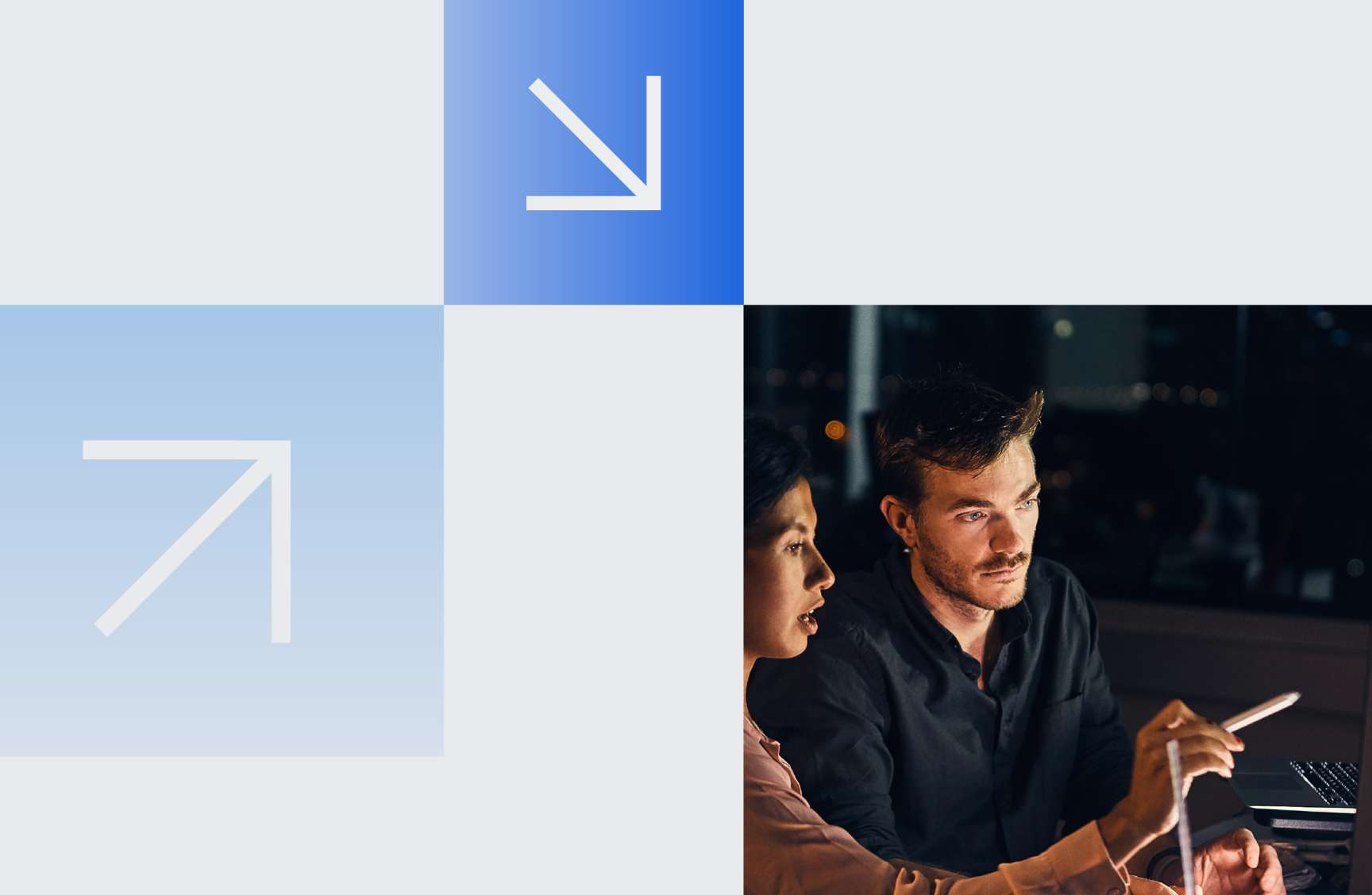 Two professionals reviewing data on a laptop to secure executive approval to buy an intranet.