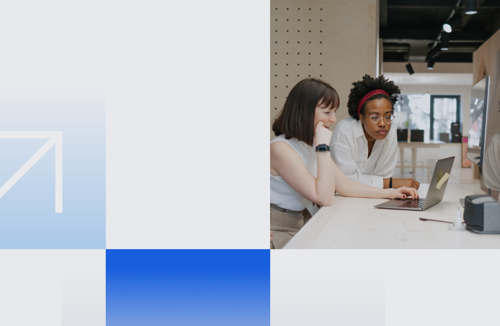 Professionals reviewing intranet options on a laptop using the intranet buyer guide to assess costs and fit.