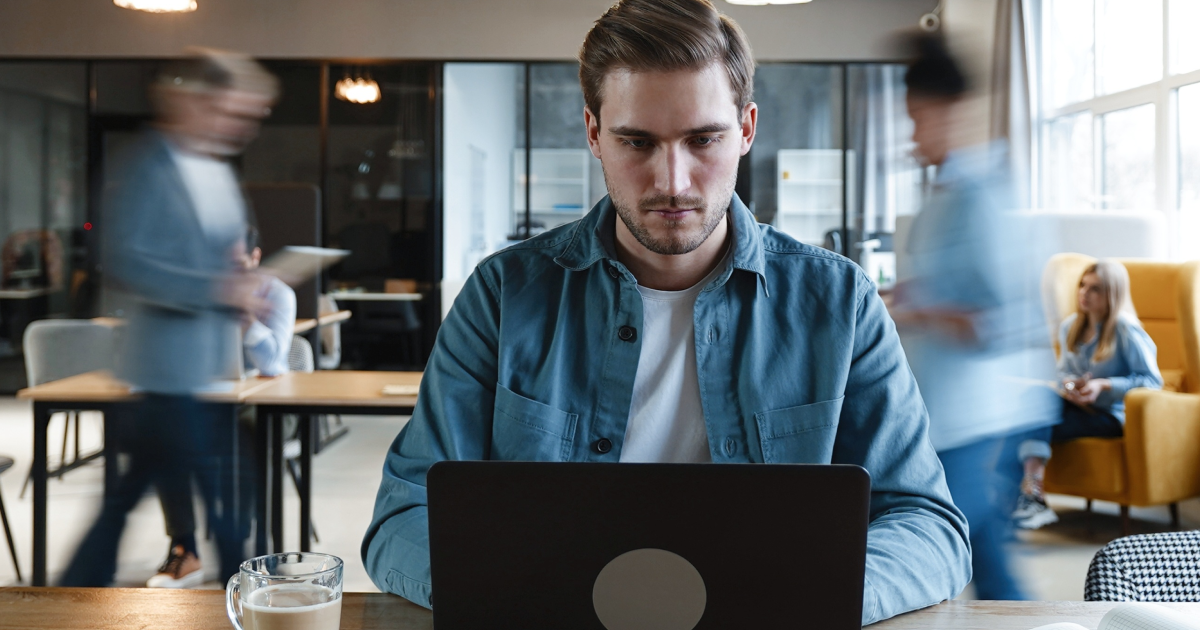 Focused professional planning the day with 10 proven time management tips to boost productivity and efficiency.