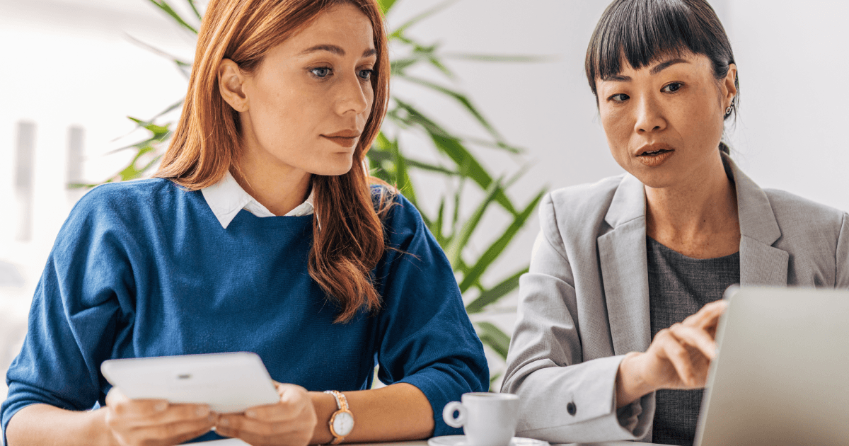 Internal communications team reviewing employee experience platform dashboards.