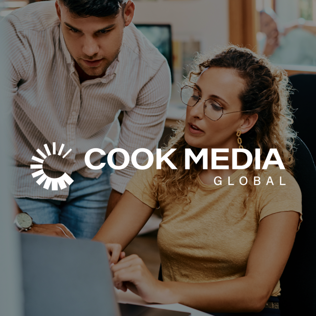 Cook Media Global executives collaborating on publishing and media initiatives